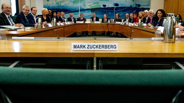 An empty chair with Mark Zuckerberg's name on, at UK Parliament DCMS committee meeting